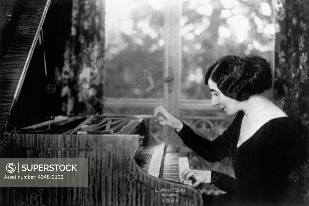 Wanda Landowska playing her harpsichord in St. Lau, France, in 1931.