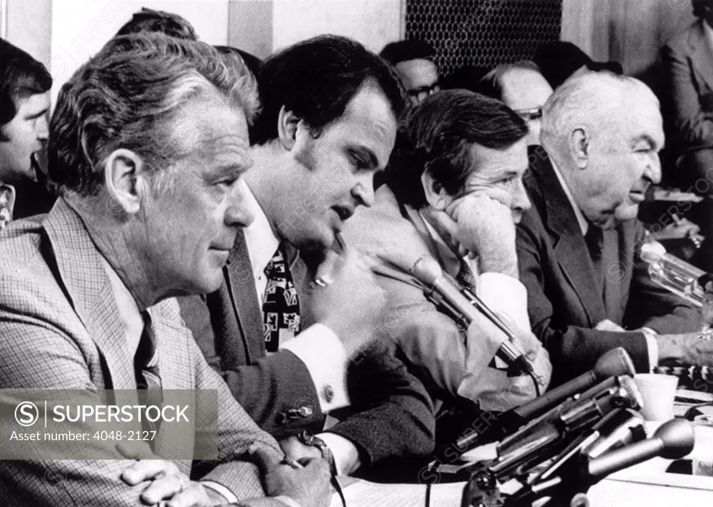 Sen. Edward Gurney, Sen. Fred Thompson, Sen. Howard Baker, Sen. Sam Ervin, listening to testimony at the Senate Watergate Committee Hearings, September 24, 1973