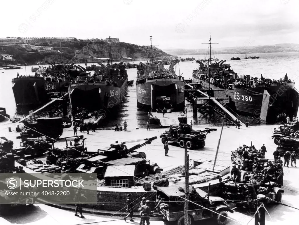 American soldiers being loaded into barges in Plymouth, England for their voyage to Normandy, France