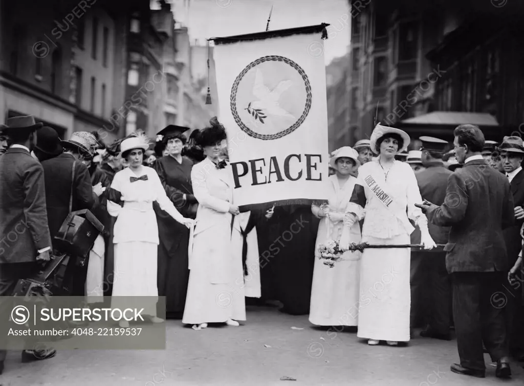 American womens peace parade in New York City, shortly after the start of World War I. On Aug. 29, 1914, they marched down Fifth Avenue, led by Chief Marshal Portia Willis FitzGerald (on right), called Prettiest Suffragette in New York State (BSLOC_2017_1_63)
