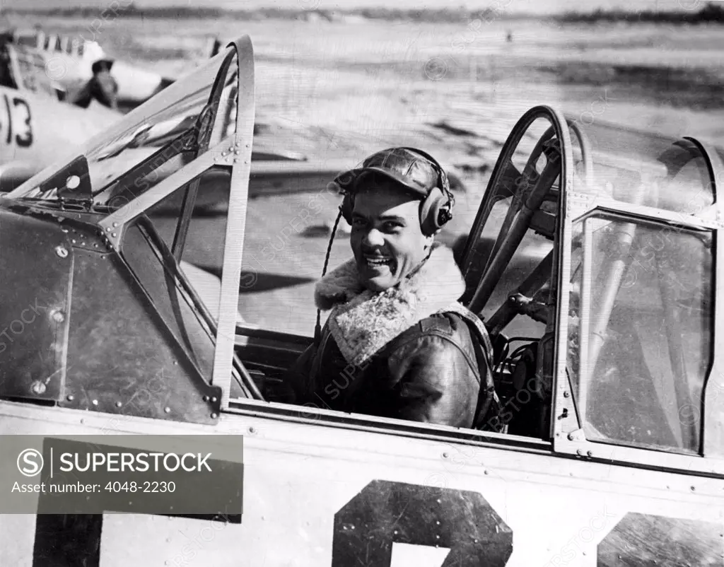 Captain Benjamin Oliver Davis of the 99th Pursuit Squadron, shown in the cockpit of an advances trainer, Tuskegee, Alabama, 1/23/42.