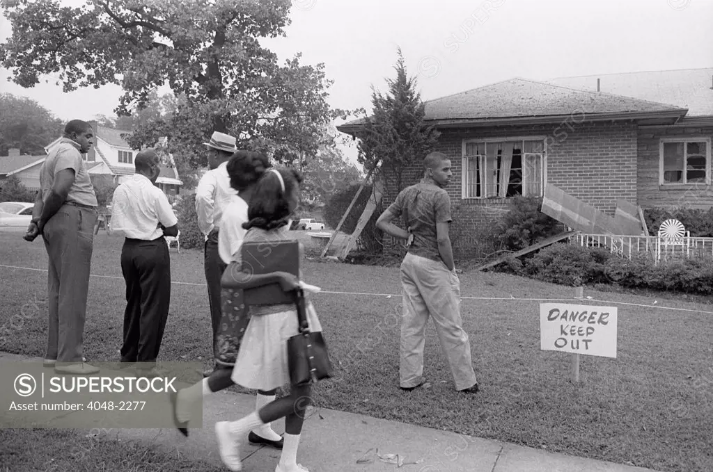 African Americans viewing the bomb-damaged home of Arthur Shores, NAACP attorney, by Marion S. Trikosko, Birmingham, Alabama, September 5, 1963.