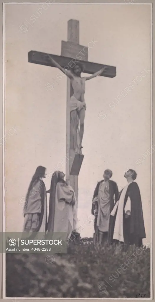 Crucifixion, frontal, with Mary Magdalene, Joseph and John, photograph by F. Holland Day, 1898.