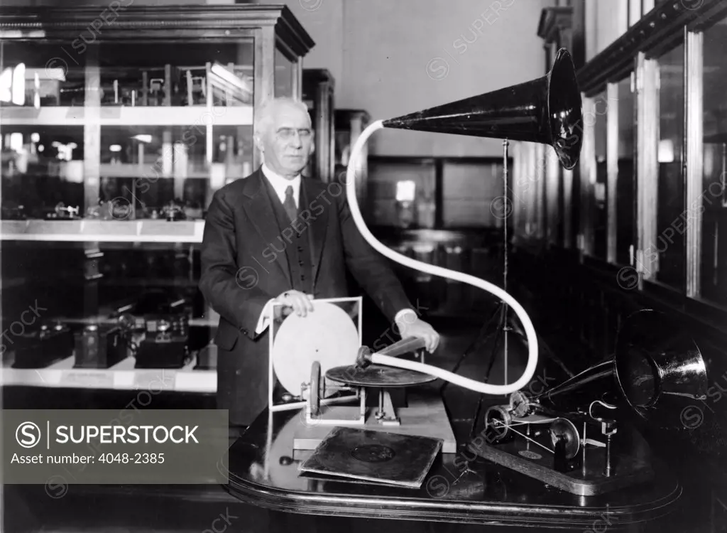 Emile Berliner with the model of the first phonograph machine which he invented c. 1920