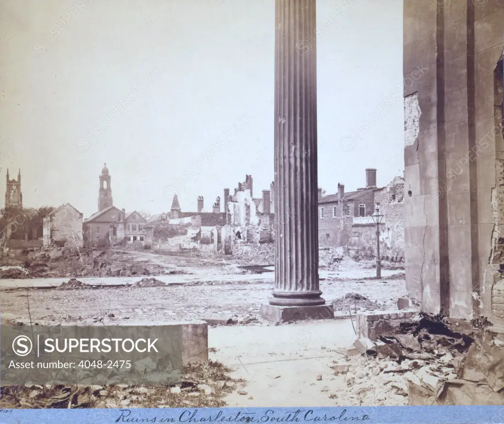 The Civil War, view of ruined buildings through porch of the Circular Church, at 150 Meeting Street, Charleston, South Carolina, 1865.