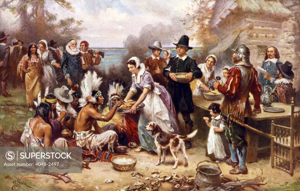 The first Thanksgiving, 1621, Pilgrims and natives gather to share a meal, oil painting by Jean Louis Gerome Ferris, 1932.