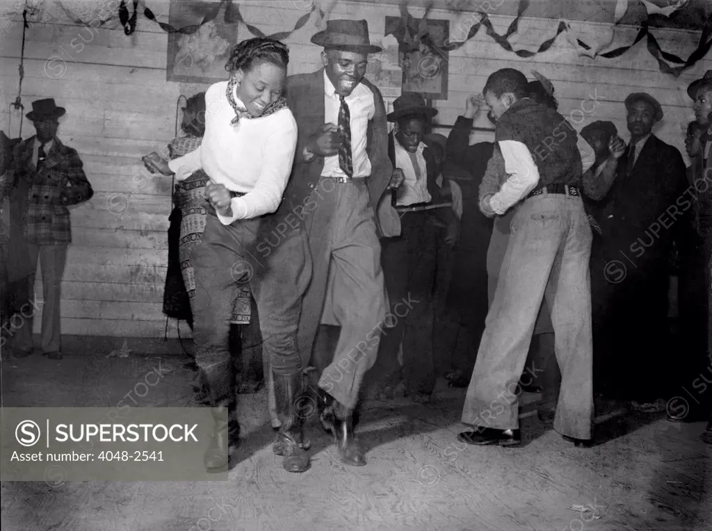 African American juke joint, original title: 'Jitterbugging in a Negro Juke Joint on Saturday evening, outside Clarksdale', by Marion Post Wolcott, Clarksdale, Mississippi, 1939.