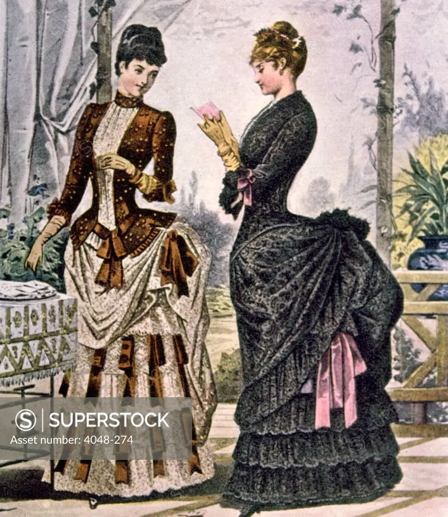 Two women wearing bustle dresses, circa 1880s. Photo: Courtesy Everett Collection