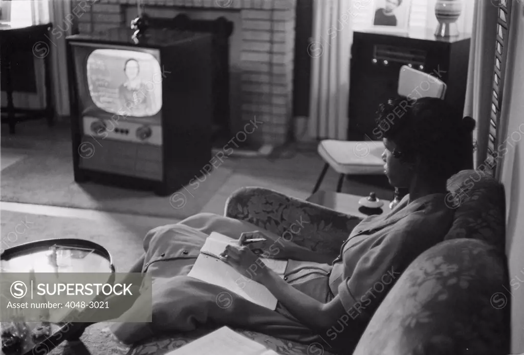 Civil Rights, an African American high school girl being educated via television during the period that schools were closed to avoid integration, photograph by Thomas J. O'Halloran, Little Rock, Arkansas, September, 1958.