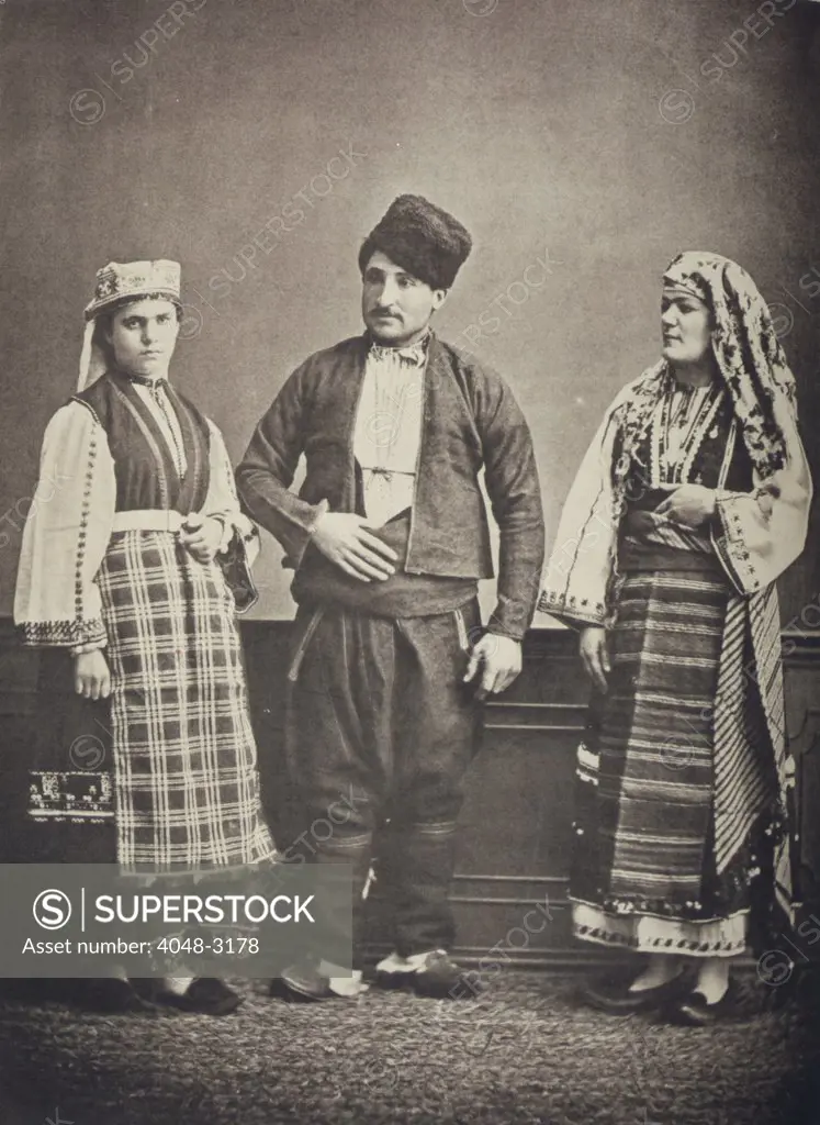 The Ottoman Empire, studio portrait of models wearing traditional clothing from Istanbul, Bulgarian woman of Ahi Tchelebi, Greek peasant woman of Manastir, Greek peasant of Manastir, photograph by Pascal Sebah, 1873.