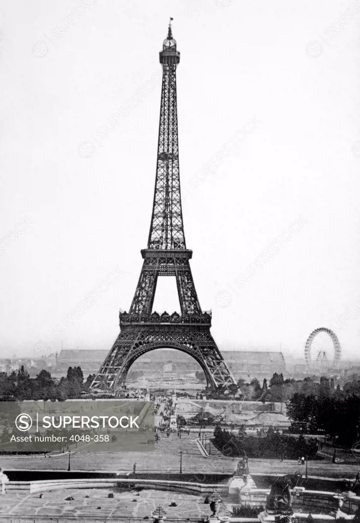 The Eiffel Tower with The Great Wheel of the Universal Exhibition in the background, c. 1900.