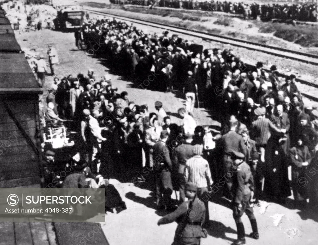 Selection and separation of prisoners at the Auschwitz-Birkenau concentration camp railway station in Poland, ca. 1944