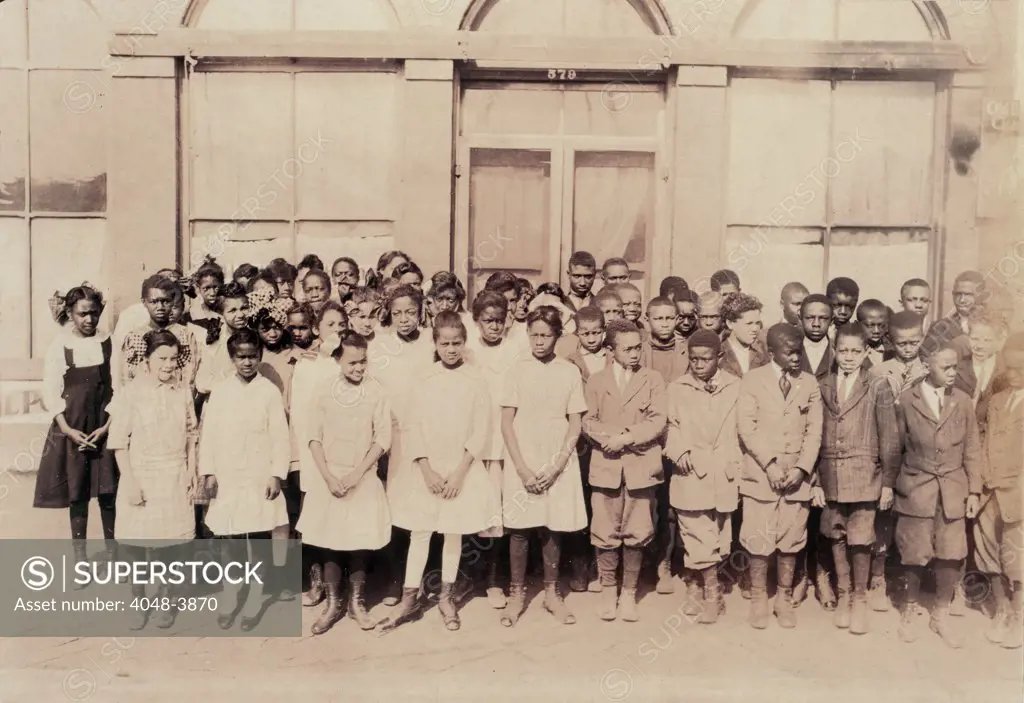 African American High School, original caption: '75 Sixth Grade children (colored) crowded into 1 small room in an old store building near Negro High School, with one teacher', Muskogee, Oklahoma, photograph by Lewis Wickes Hine, March, 1917.