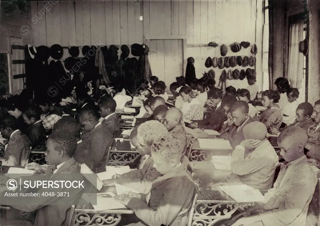 African American High School, original caption: '75 Sixth Grade children (colored) crowded into 1 small room in an old store building near Negro High School, with one teacher', Muskogee, Oklahoma, photograph by Lewis Wickes Hine, March, 1917.