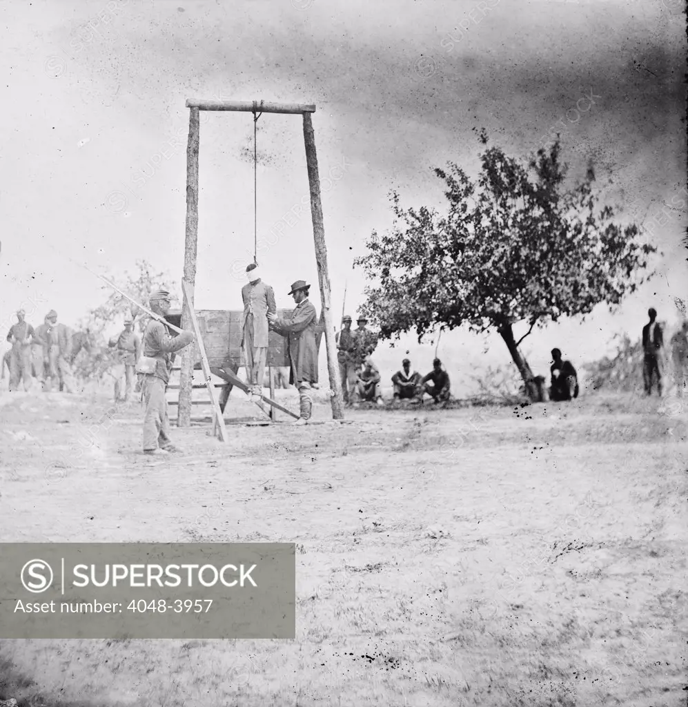 The Civil War, an executed African American man, title: 'The hanged body of William Johnson, A negro soldier', Jordan's Farm, Petersburg, Virginia, photograph, June 20, 1864.