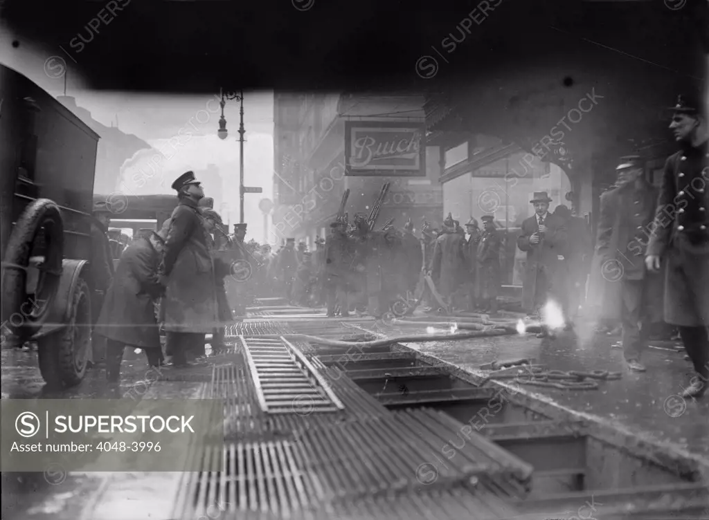New York City subway fire, breaking through subway roof, Broadway and West 55th Street, New York City, photograph, January 6, 1915.