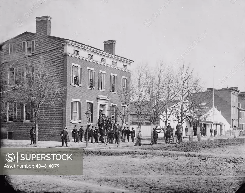 The Civil War, clerks in front of office of Commissary General of Prisoners, F Street at 20th, Washington DC, photograph, 1865.
