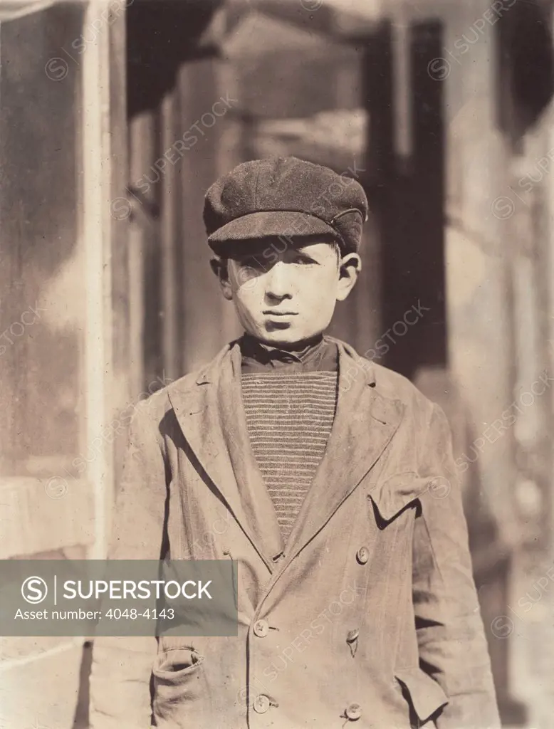 Child labor, coconut shaver, Kibbe's Factory, Isaac Futterman, 15 years, of 108 Sharon Street, has been working one year, earns $3.50, Springfield, Massachusetts, photograph by Lewis Wickes Hine, October, 1910.