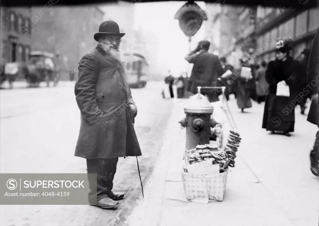 New York City, Pretzel vendor, 6th Avenue, New York, photograph circa 1900s-1920s