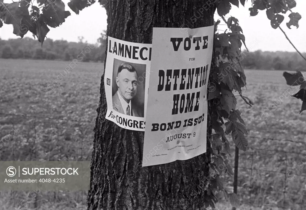 Campaign posters, central Ohio, Route 40. Summer 1938. Ben Shahn, photographer.