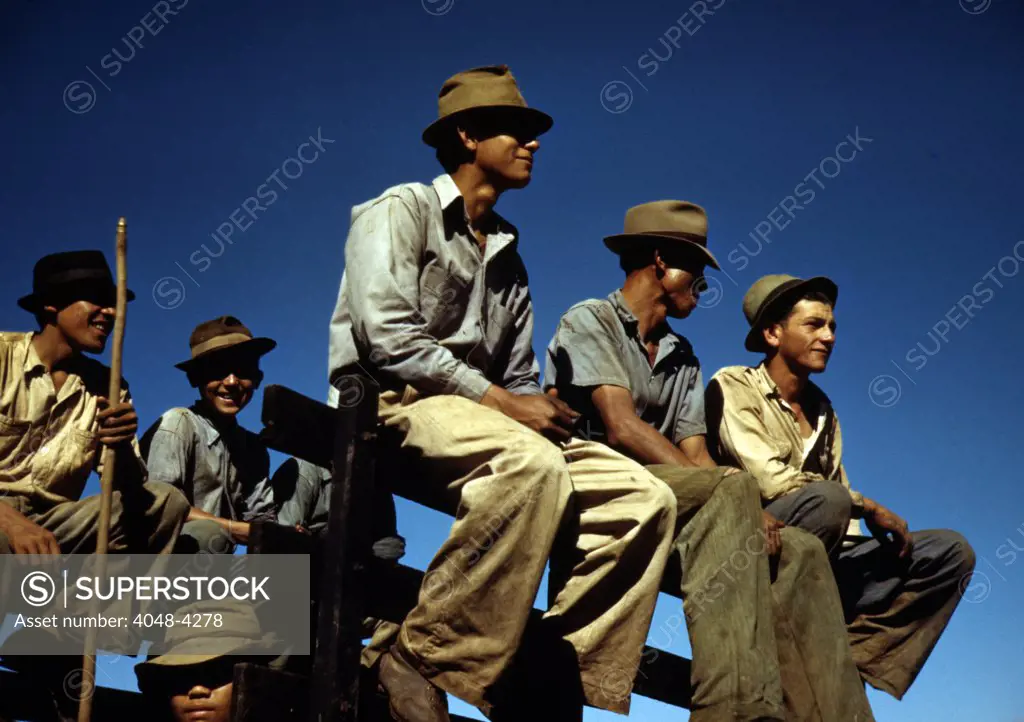 Puerto Rico. Sugar cane workers resting at the noon hour, Rio Piedras, Puerto Rico. Photograph by Jack Delano, 1941.