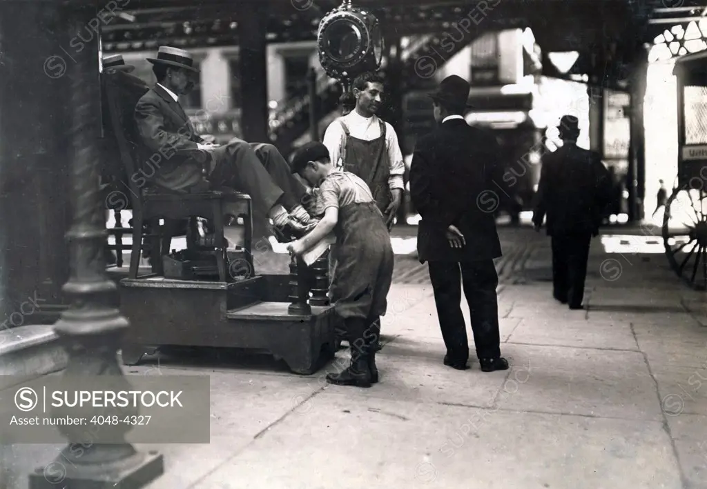 Child labor, Bootblack at 3rd Avenue and 9th Street, New York City, photograph by Lewis Wickes Hine, July, 1910