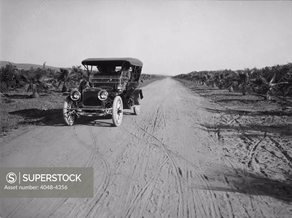 California, California Citrus Heritage Recording Project, view of Dufferin Avenue and vehicle, Riverside, Riverside County, circa 1930s.