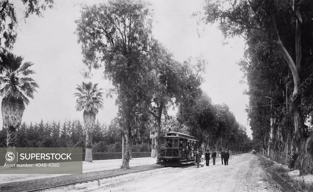 California, California Citrus Heritage Recording Project, view of Magnolia Avenue with electric street car, Riverside County, circa 1920s-1930s.