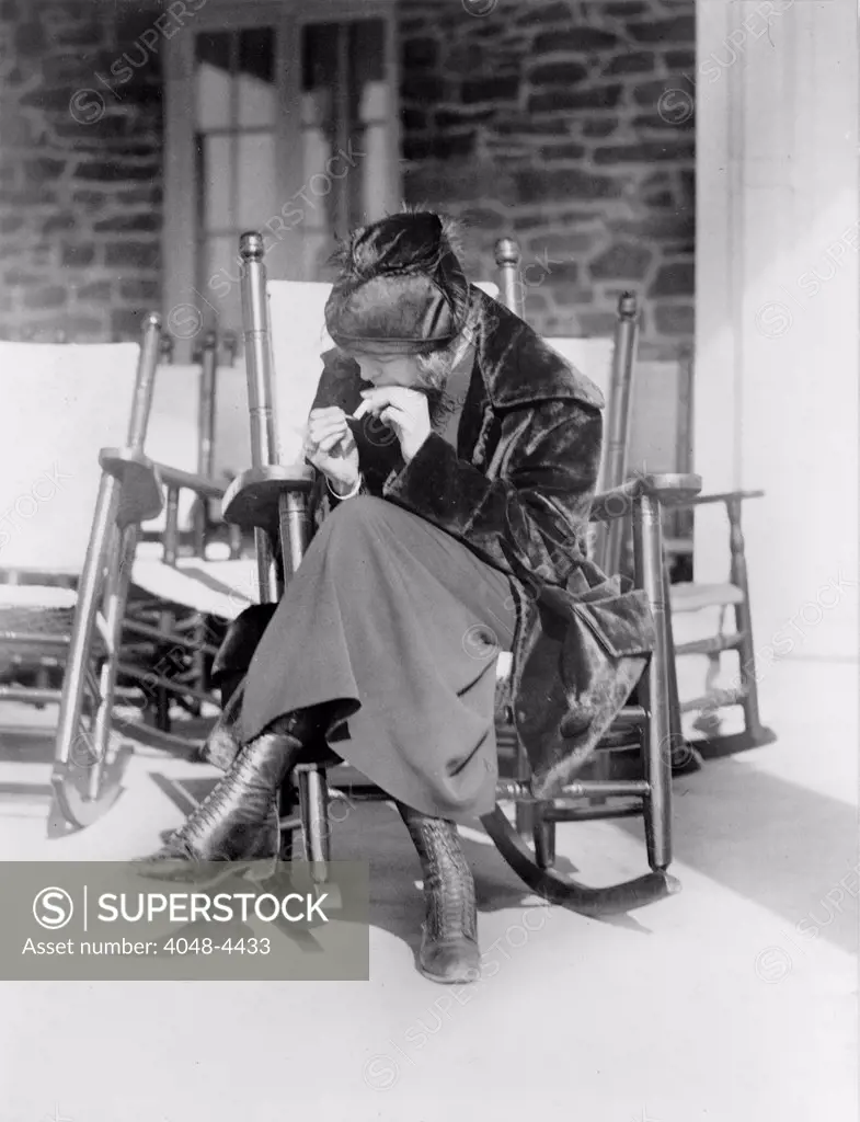 Sarah Anderson, a Washington suffragist who advocates equal smoking rights for men and women in public places, at the Chevy Chase Club, Washington's most exclusive country club, photograph circa 1909-1930