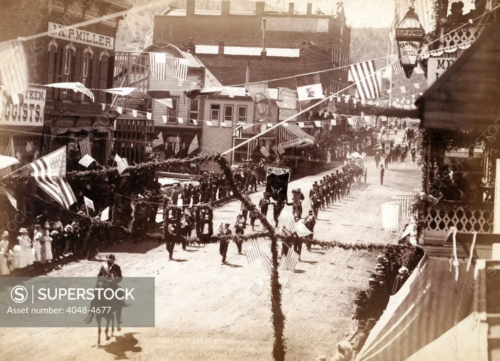Jollification. Parade celebrating the building of D.O.R.R. road to Lead City. Deadwood, Dakota Territory. photo by John C. Grabill, 1887