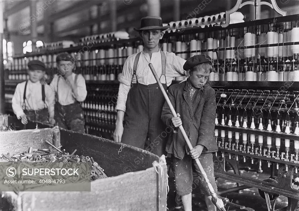 A textile mill. Sweeper and doffer boys in Lancaster Cotton Mills, Lancaster, S.C. Photograph by Lewis Wickes Hine, December 1, 1908.