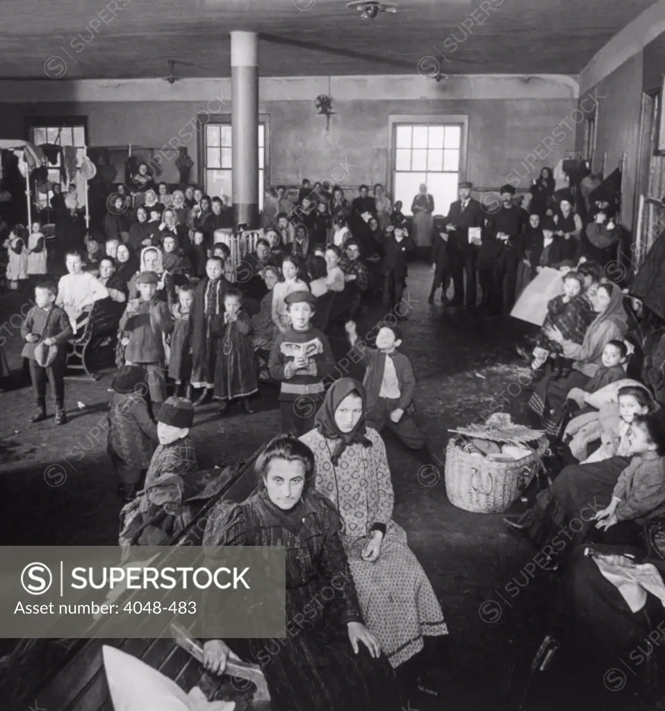 Immigrants awaiting examination at Ellis Island, 1902.