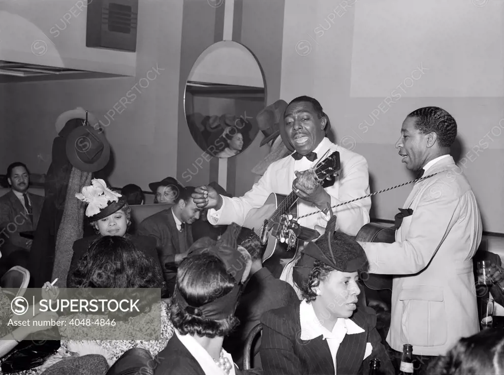 Entertainers at Negro tavern. Chicago, Illinois. Lee Russell photograph, 1941