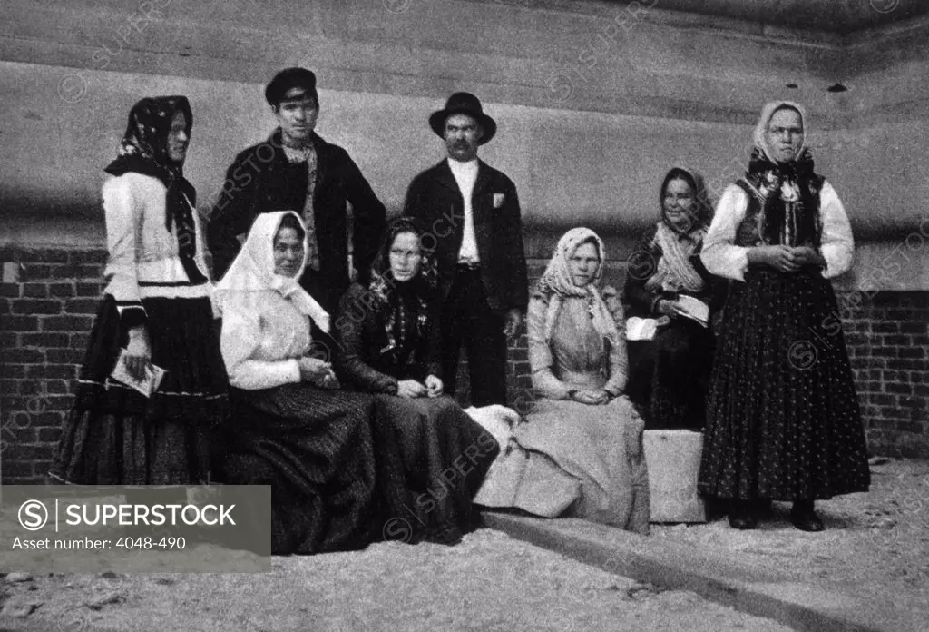 A family group of immigrants just arrived in America, c. 1902.