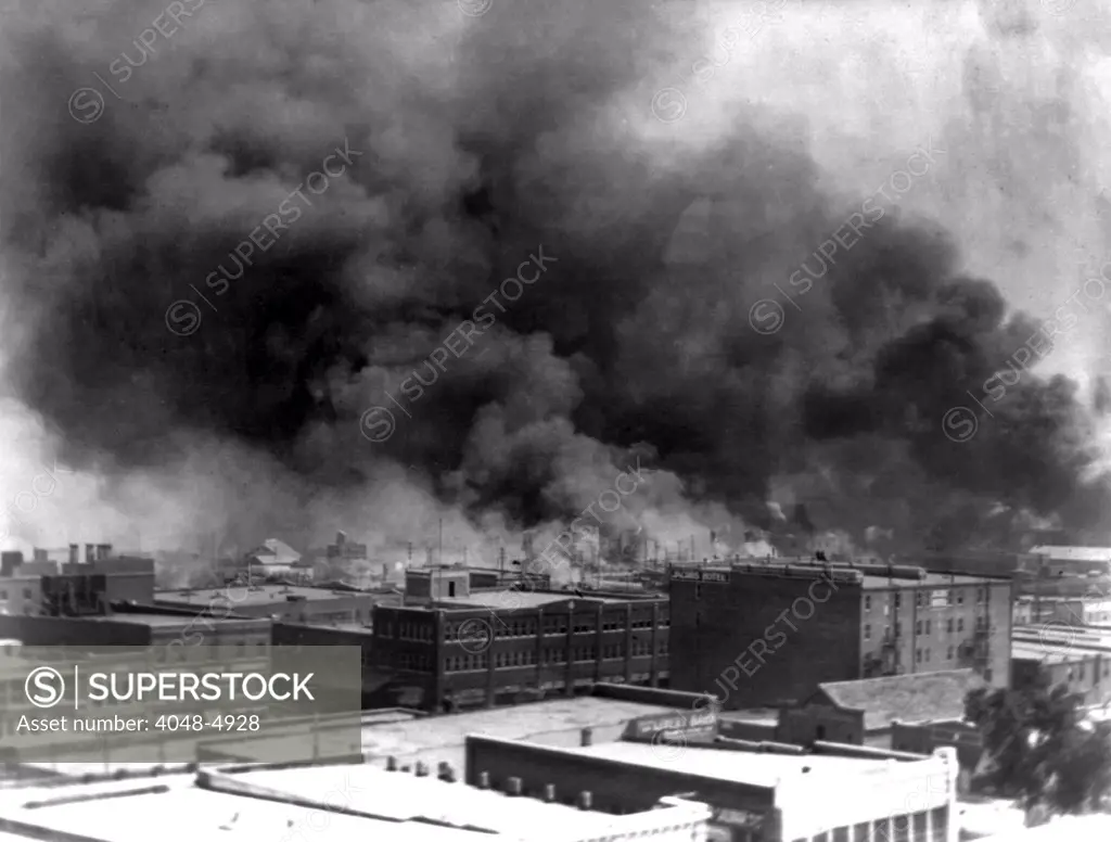Tulsa. Smoke billowing over Tulsa, Oklahoma during the 1921 race riots.