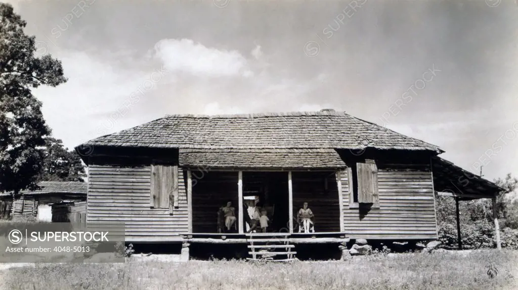 The family home of Floyd Burroughs, cotton sharecropper. Hale County, Alabama. Published in the book, 'Let Us Now Praise Famous Men'. photograph by Walker Evans, 1936.