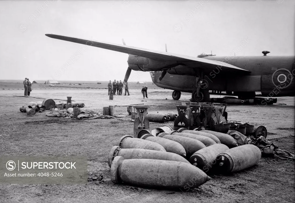 Bombs lie on an Allied airfield ready to be loaded into Royal Air Force Liberators. The British bombers of the Mediterranian Allied Air Forces worked with American Liberators to strangle German supply lines feeding Nazi troops on the Anzio, Cassino and Eighth Army fronts. ca. 1942-1945