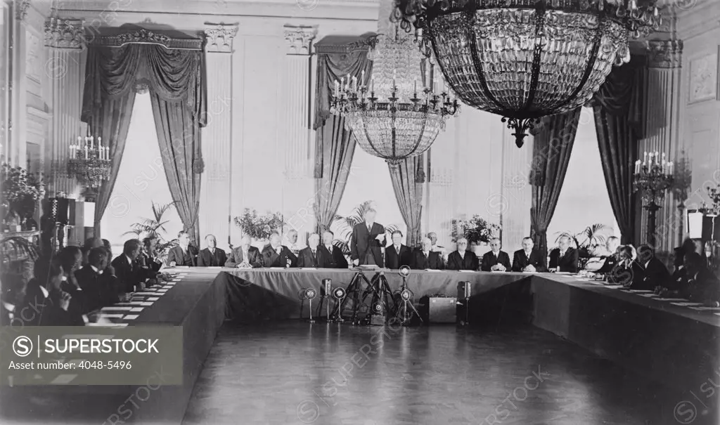 Scene in the East Room of the White House when the President received representatives of the Nations who have ratified the Kellogg-Briand Pact of 1928, a international agreement prohibiting war.