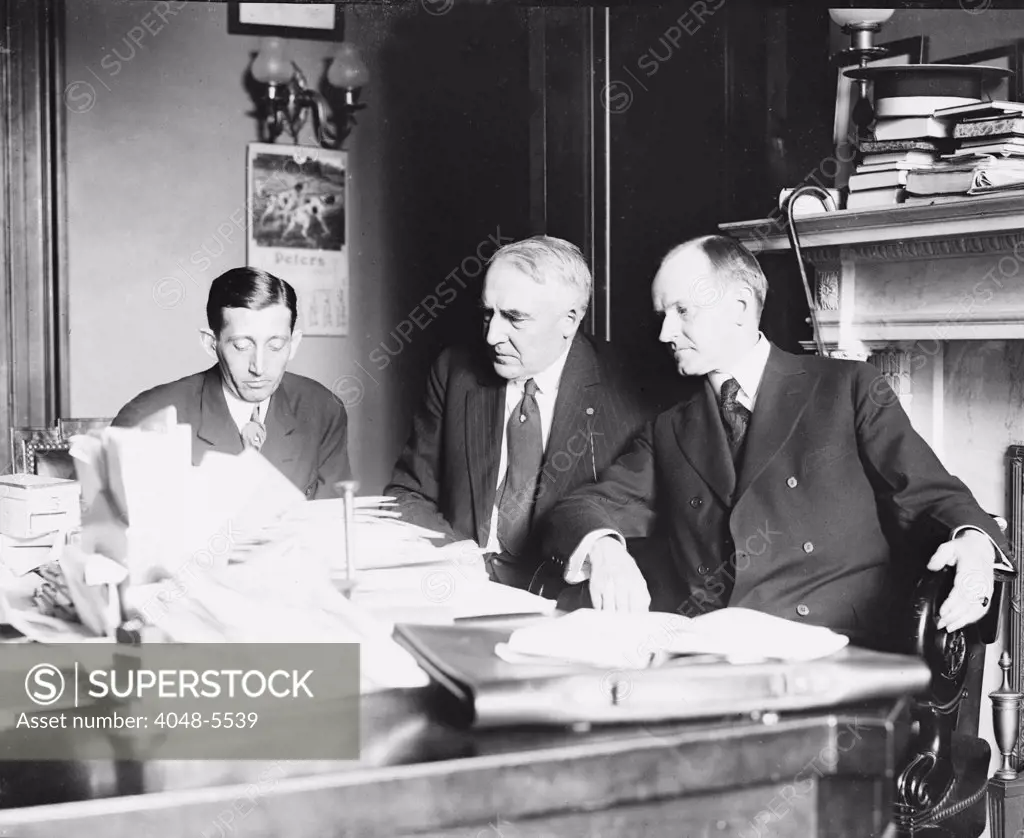 President Warren Harding (1865-1923) with his Vice President, Calvin Coolidge and Postmaster General Will Hayes.