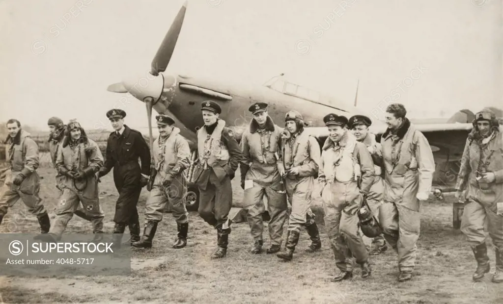 A Hawker Hurricane and 12 U.S. volunteers of Eagle Squadron in the R.A.F. prior to America's entry into World War II. in England, 1940. 244 Americans served with the three Eagle Squadrons in the first years of World War II.