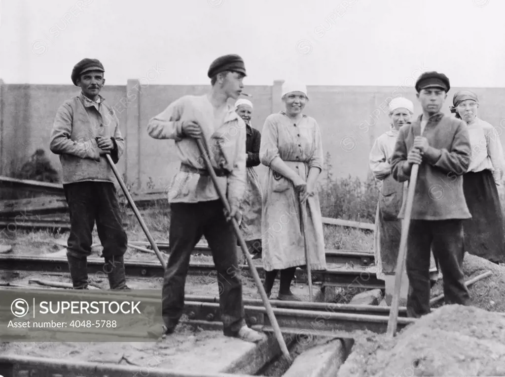 Russian men and women railroad track workers on the job in Petrograd, 1922. The Bolsheviks promoted the ideal of women's equality, a novel idea at the time, and one that was imperfectly implemented.