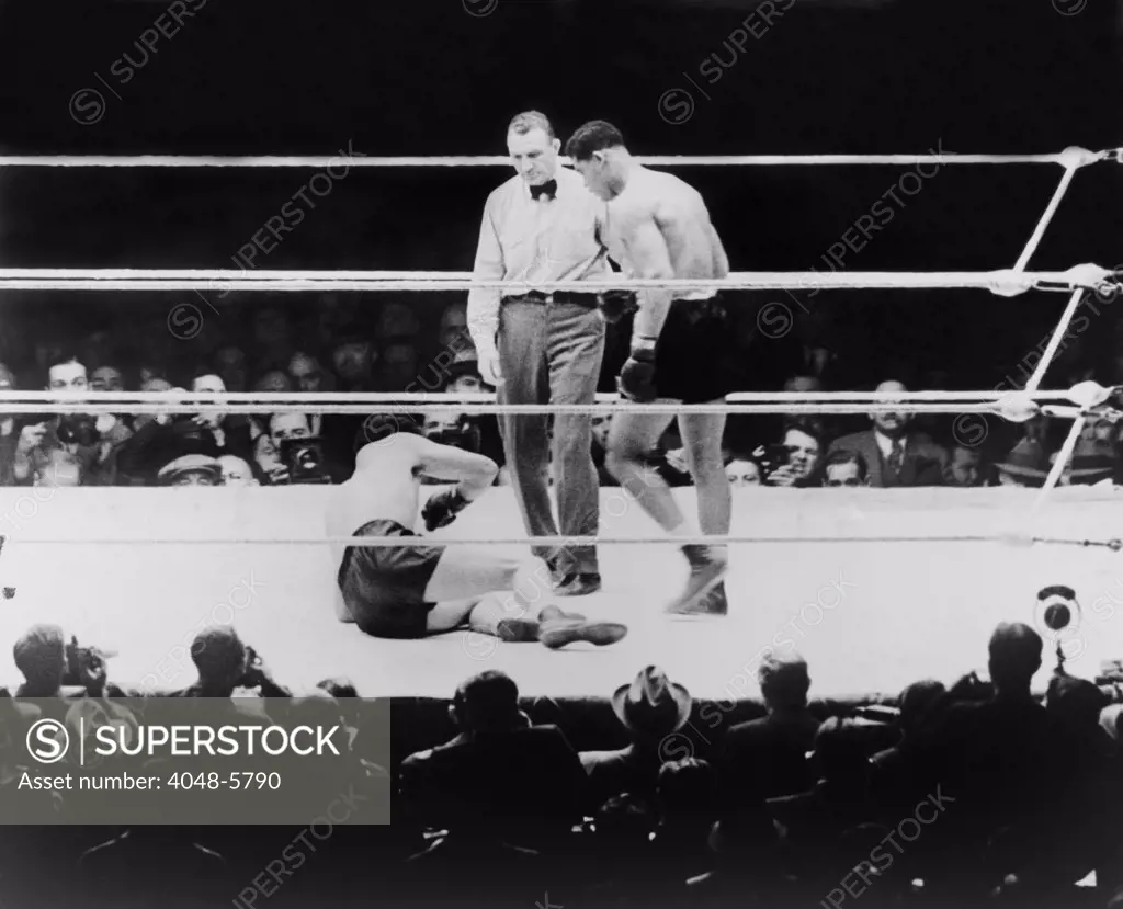 Max Baer (1909-1959), knocked down during a heavyweight fight with Joe Louis, September 24, 1935. Louis won by a knockout.