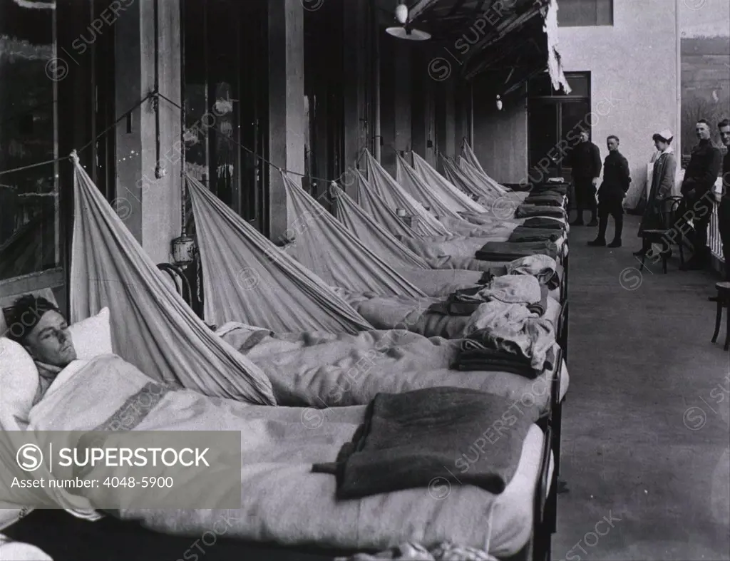 Spanish Flu Epidemic 1918-19. An pneumonia porch at the U. S. Army Camp Hospital in  Aix-les-Bains, France, during the Spanish Flu epidemic of 1918-19.  Most flu deaths were of healthy young adults, who died from bacterial pneumonia, a secondary infection caused by the influenza.