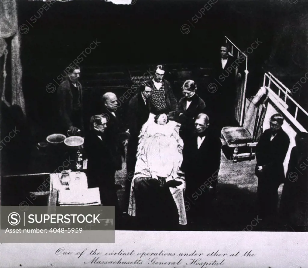 Fully dressed female patient lying on the operating table, surrounded by the surgeons of Massachusetts General Hospital in one of the earliest operations performed under ether anesthesia.  Among the surgeons is  Dr. John Collins Warren, the doctor who first demonstrated surgical anesthesia.