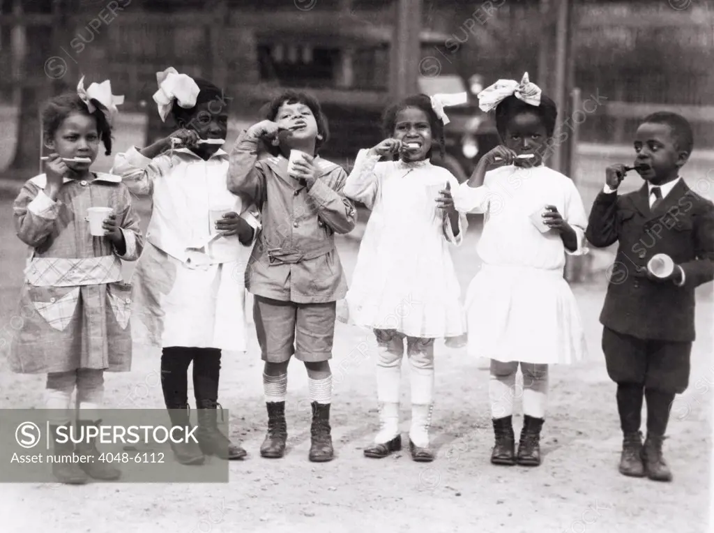 African American first graders learn to brush their teeth at the Miner Normal School near Washington, D.C. ca. 1910.