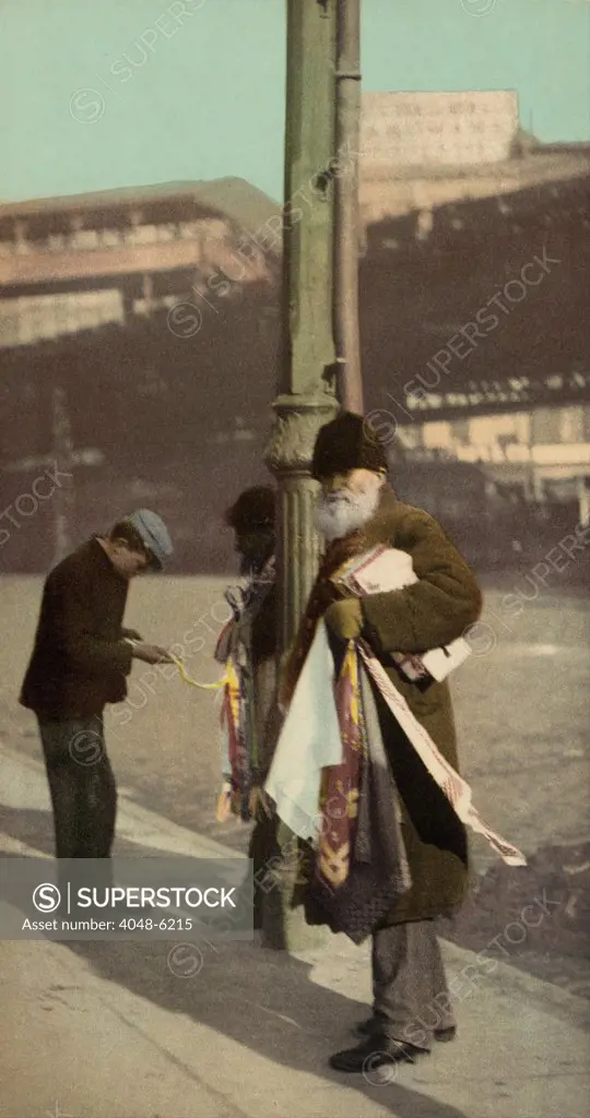 Two Jewish peddlers selling ties on the street, probably New York. Ca. 1902.