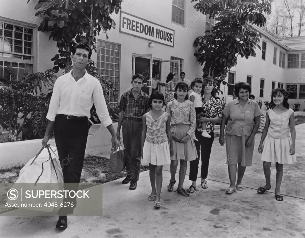 Cuban refugee family in Miami, Florida in 1966. From 1965 through 1972, Cuba allowed 250,000 people to leave Cuba, leaving their homes and assets behind.  The U.S. government supported the 'Freedom Flights' and eased the refugees adjustments until the program was cancelled by Cuba in 1972.