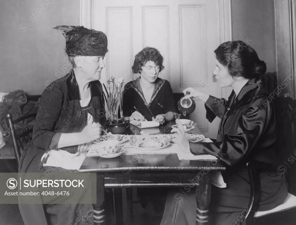 Three feminists activists in conference. Left to right: Dora Lewis Lawrence, activists and philanthropists; Pauline Floyd,(later the youngest lawyer admitted to practice before the supreme court) and Alice Paul. Ca. 1910-1920.