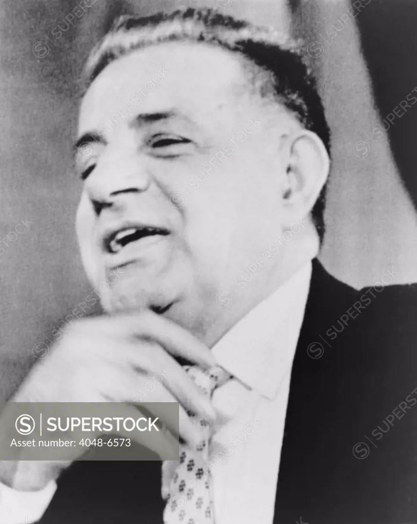 Joseph Valachi, 'singing' during appearance before Senate Investigations subcommittee in 1963. Valachi, a lifelong Mafia insider, provided detailed testimony on Mafia organization, culture, and leaders. Charles Bronson portrayed the gangster in the 1972 movie, THE VALACHI PAPERS.