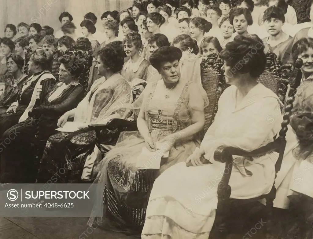 Alva Belmont, seated second from right, was the wealthy former wife of a Vanderbilt and Belmont, and the most important financial benefactor of the National Woman’s Party. Dripping in jewels, she attends the Women's Voter Convention, Sept. 1915.